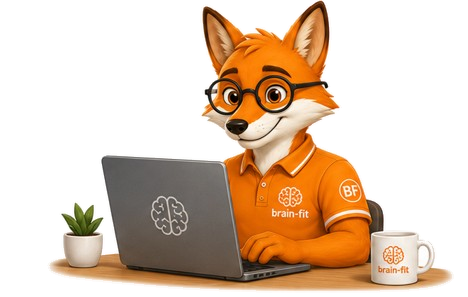 Finn, das Brain-Fit Maskottchen, am Laptop